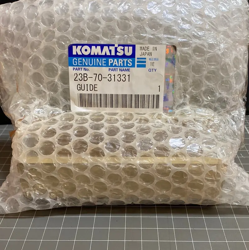 Komatsu Genuine Part,  23B-70-31331 Guide, Blade 1